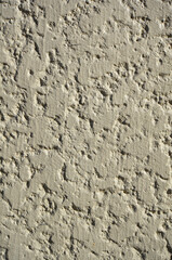 Acrylic stucco wall texture background. Close-up of grunge plasterer wall.