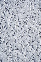 Acrylic stucco wall texture background. Close-up of grunge plasterer wall.