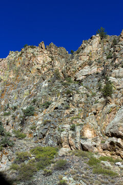 Towering canyon walls along the Cache La Poudre Wild and Scenic River in Colorado