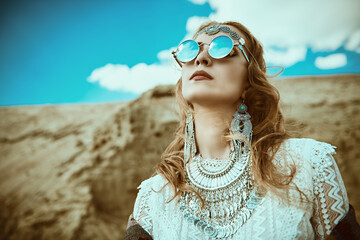 bohemian girl in desert © Andrey Kiselev