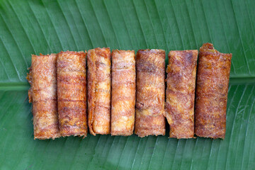 Sun dried banana roll snacks
