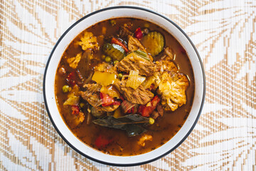 healthy plant-based food, vegan turkish hotpot with Mediterranean vegetables and vegan meat chunks in spicy broth