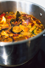 healthy plant-based food, vegan turkish hotpot with Mediterranean vegetables and vegan meat chunks in spicy broth