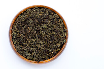 Dried Jiaogulan on white background.