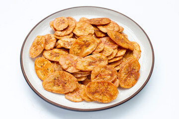 Banana chips on white background