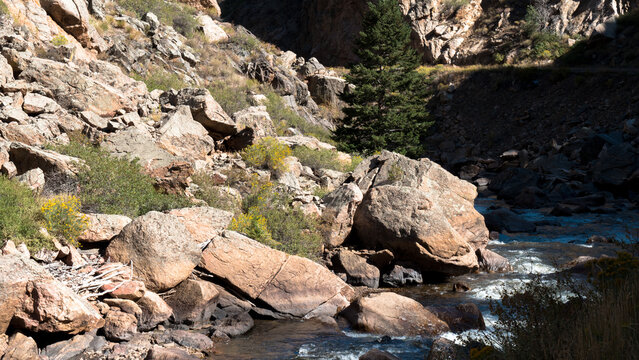 Boulders and rushing water on the Cache La Poudre Wild and Scenic River in Colorado