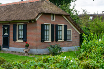 Fototapeta na wymiar Giethoorn Netherlands Venice of the North old house in the village