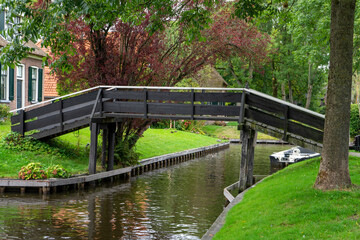 Fototapeta premium Giethoorn Netherlands Venice of the North bridge over the canal in the village center