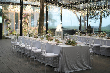 Flowers decoration for wedding or fine dinning table in private party. Family intimacy dinner night...