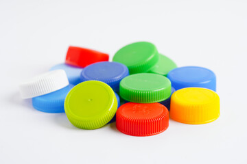 Plastic bottle caps colorful for recycle on white background.