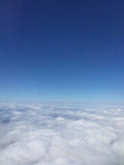 blue sky with clouds taken from the airplane