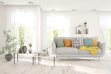 White living room with sofa and summer landscape in window. Scandinavian interior design. 3D illustration