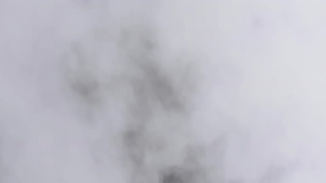 Smoke or vapor explosion with Alpha channel. Realistic clouds rise up on transparent background. Slow Motion. Special effect, texture, use in composite and video editing. Smoke atmosphere fog overlay