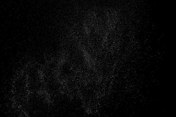 Obraz premium Distressed white grainy texture. Dust overlay textured. Grain noise particles. Rusted black background. Vector illustration. EPS 10. 