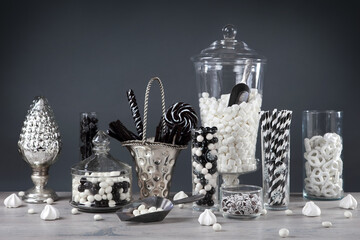 Black and White candy bar with glass jars filled with candy