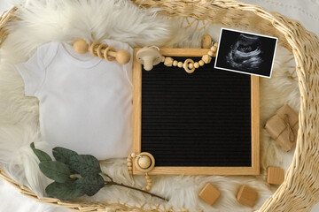 Letter board Baby Announcement with basket. Baby Clothing Mock Up . Space for design . Pregnancy...