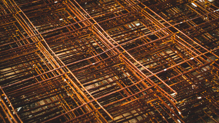 Rusty steel wire structure as the background image.