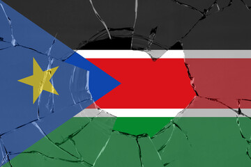 3D Flag of South Sudan on a glass breakage background.