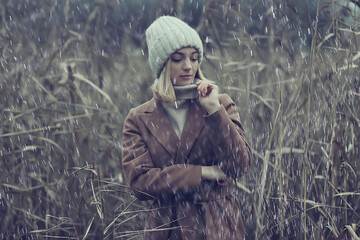 autumn fashionable portrait romantic girl in grass, travel seasonal look