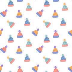 Seamless pattern with pompom hats