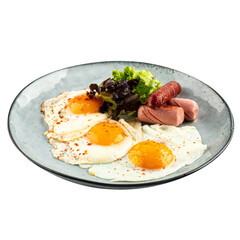 Portion of fried eggs with sausages breakfast