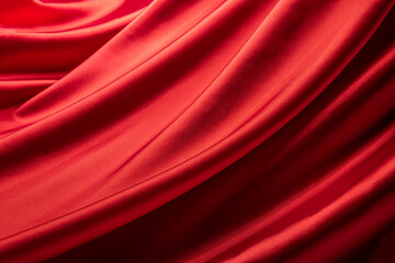 Fototapeta ドレープのある赤いシルクの布の背景テクスチャー obraz