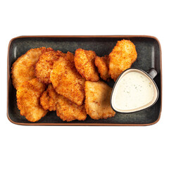 Portion of fried chicken nuggets with sauce