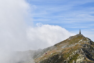 The statue of the Redeemer, on the summit of Mombarone, the border peak between Piedmont and Valle d'Aosta
