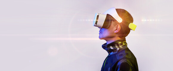Man is using virtual reality headset. Concept of virtual, augmented and extended reality and...