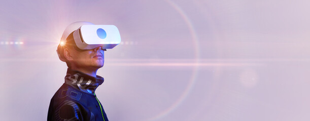 Man is using virtual reality headset. Concept of virtual, augmented and extended reality and metaverse.