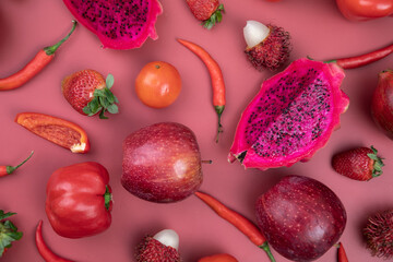 RED MONOCHROME:
A flat lay image which shows red , vibrant fresh vegetables and fruits with the same colour backdrop
 - Powered by Adobe
