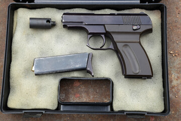 A pistol in the case