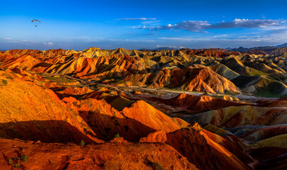 Beautiful sunset at the badlands of the Dangxia Landforms, between the Gobi Desert and the Qilian...