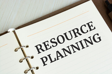 Word text RESOURCE PLANNING on white paper