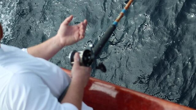 Rockfish getting gaffed in slow motion