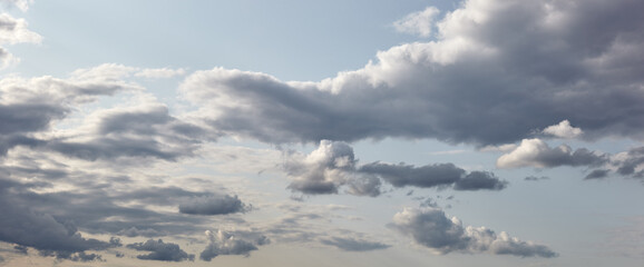 Fototapeta na wymiar Dramatic black cloud before rainy. Beautiful cloudscape over horizon, sky