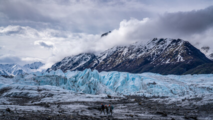 Rays through clouds over mountains in Matanuska Glacier 