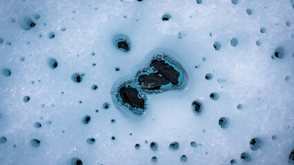 Holes in ice of a glacier in Matanuska