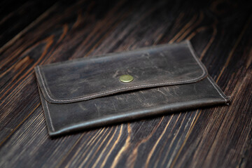 Brown men's clutch made of genuine leather