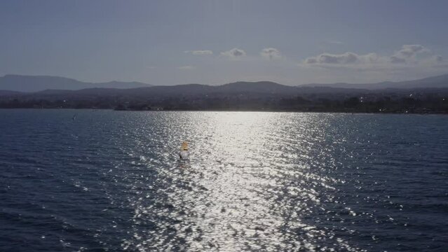 Aerial - Windsurfer in Greece at midday