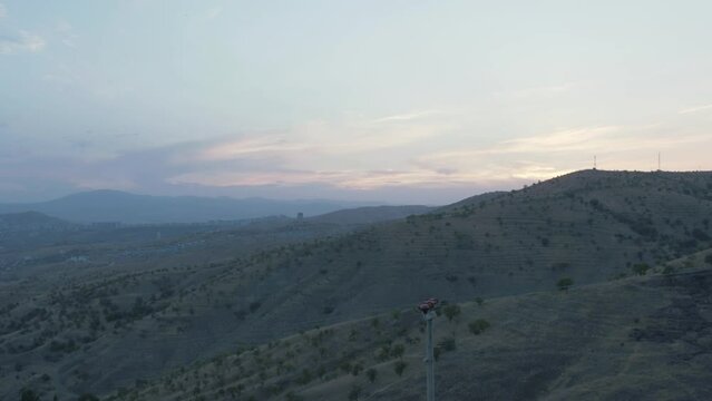 Rugged landscape above the Turkish city of Elazig at dusk
