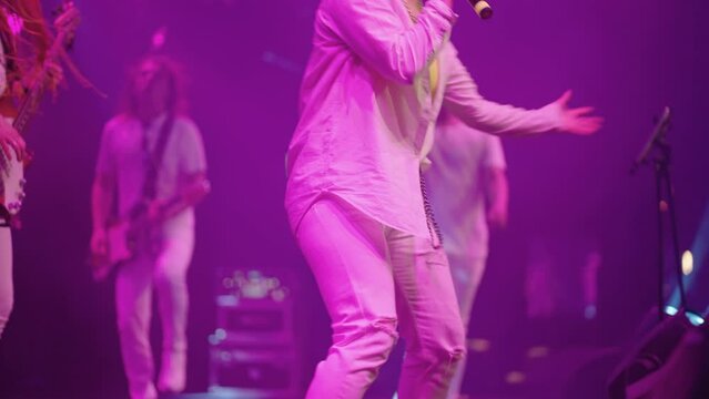 rave and gig of modern hip-hop and funk musical band, rapper man and woman are singing