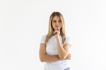 Portrait of a pretty smiling woman hands on chin posing isolated on a white background