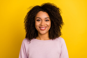Photo of young cheerful woman toothy smile clever confident representative isolated over yellow color background