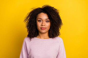 Photo of young adorable woman clever banker expert economist curls isolated over yellow color background