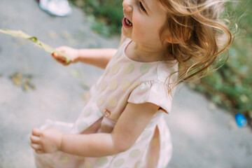little girl playing in a park