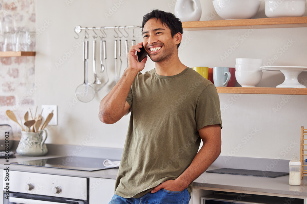 Poster Asian man, communication and phone call in kitchen while laughing, happy and talking to contact with 5g network at home. Male with a smile while networking and having conversation about good service