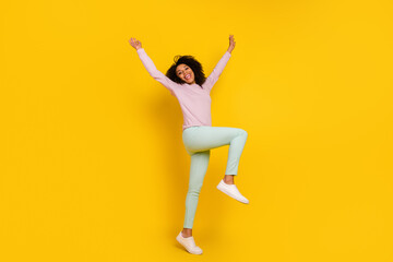 Fototapeta na wymiar Full length profile side photo of young pretty woman good mood playful isolated over yellow color background