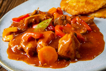 Hungarian goulash with potato pancakes