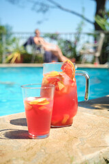 fruit cocktails by the pool